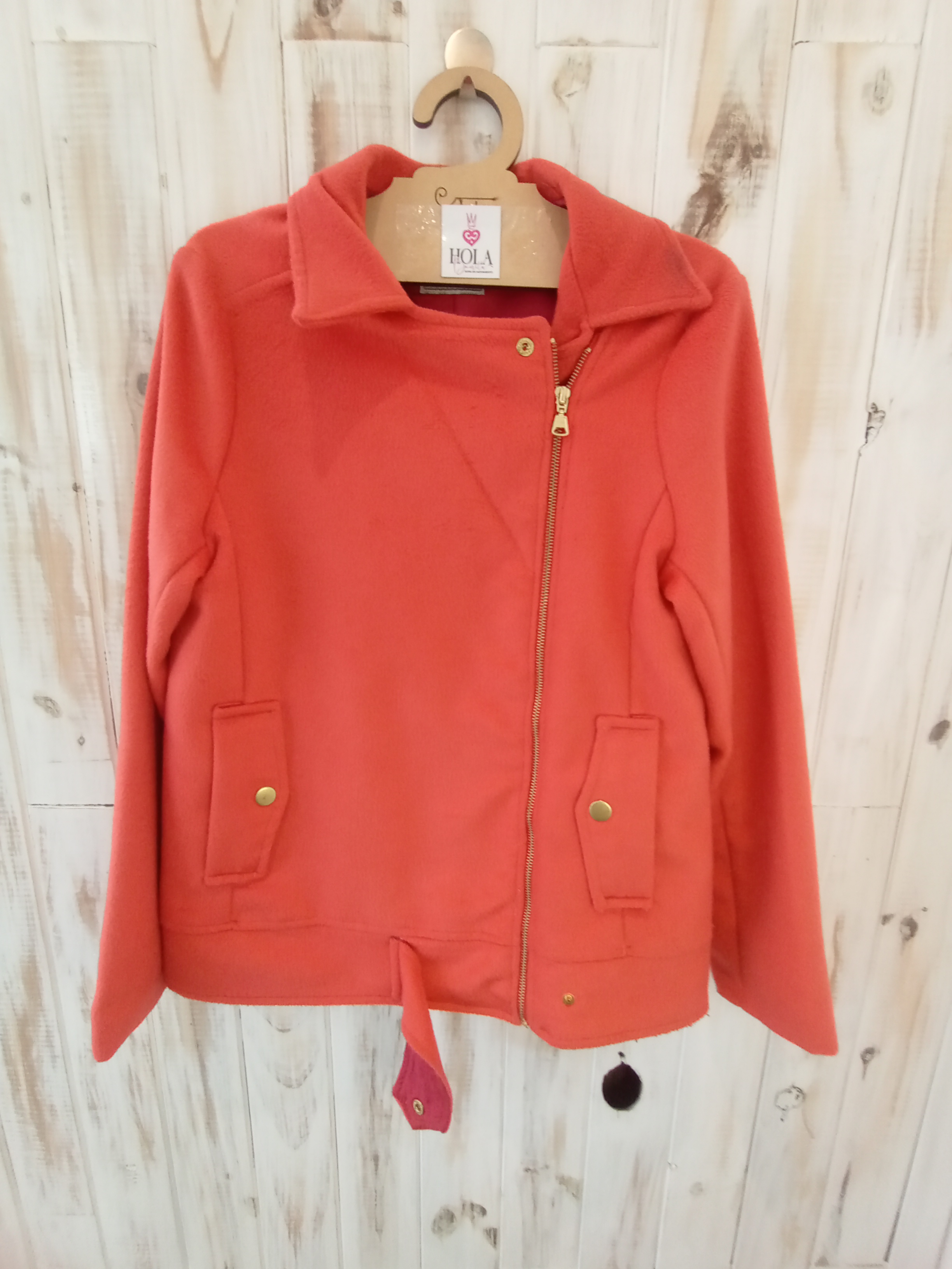 Saco paño micro polar color naranja marca inedita
