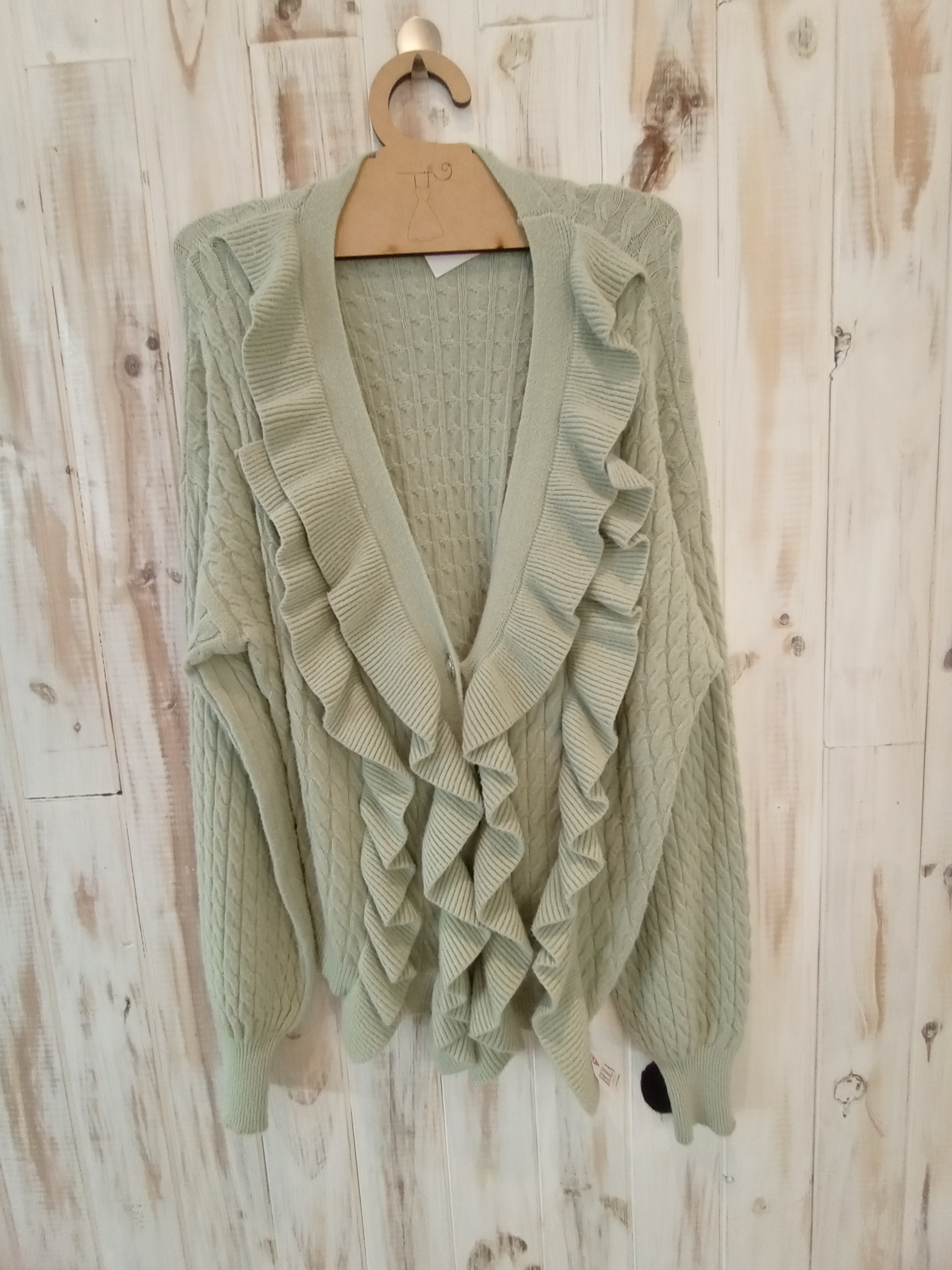 Saco verde claro con volados